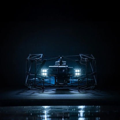 Nolvis X1 Dual Drone Package, caged indoor inspection drone illuminated during a dark operation